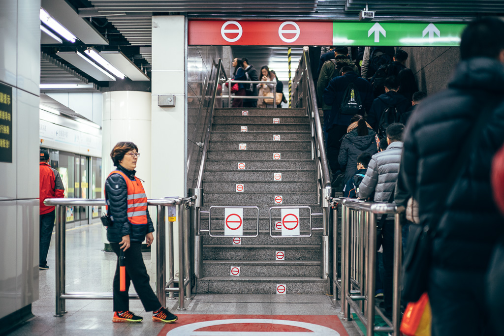 "New Policy in Busy Metro Station" by Gino Zhang, on Flickr, on 500px